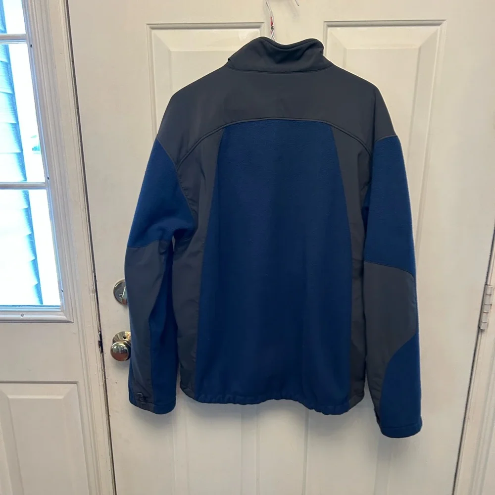 The North Face men’s fleece jacket M. Blue fleece/grey nylon. Decent shape.